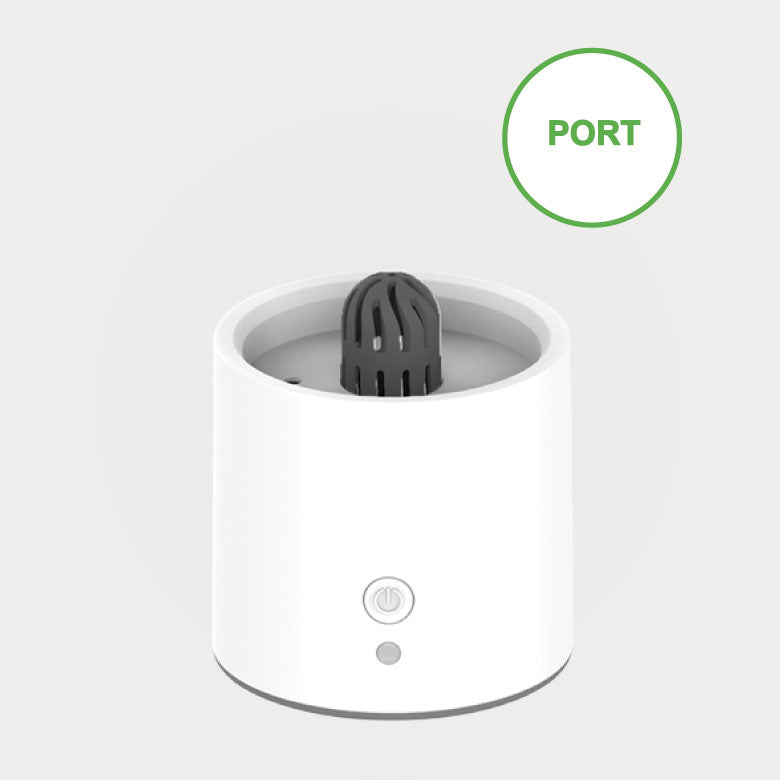 White cylindrical device with a gray top on a light gray background, featuring a 'PORT' label.