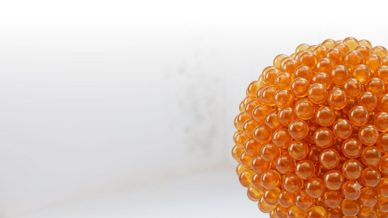 Close-up of orange beads on a white background